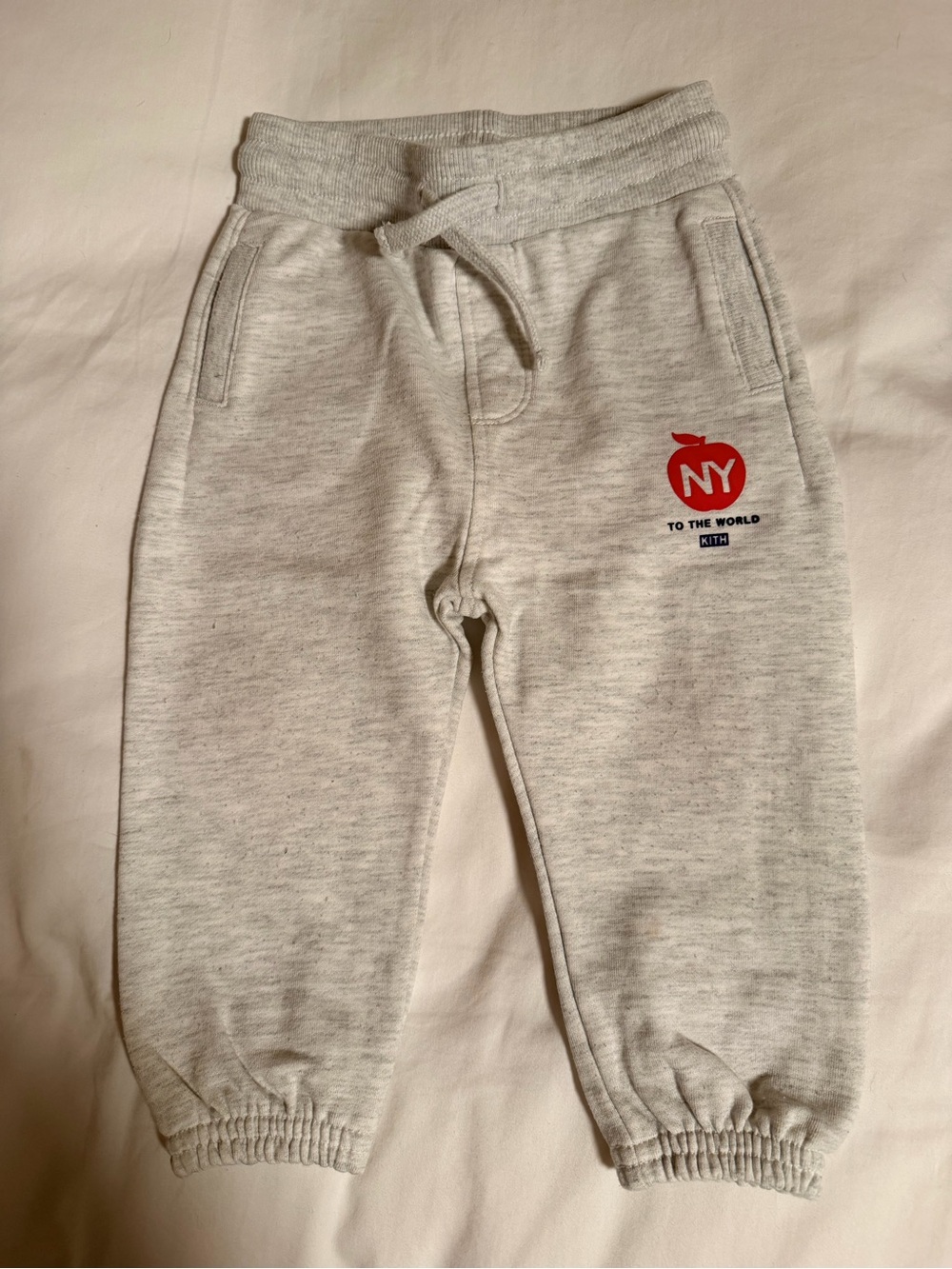 Kith Kids Light Gray Sweatpants with Red NY Apple Graphic